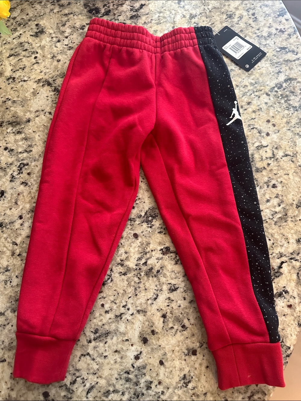 Jordan Kids Red Joggers with Black Speckle Side Panel